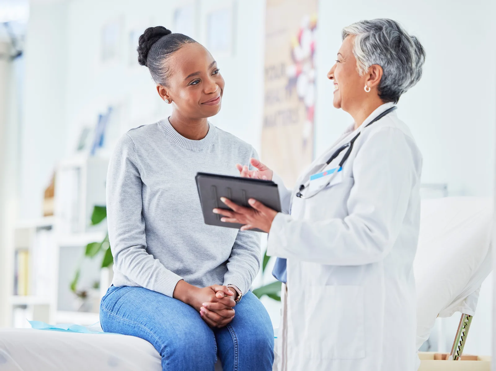 Clinician reviewing care information with a patient